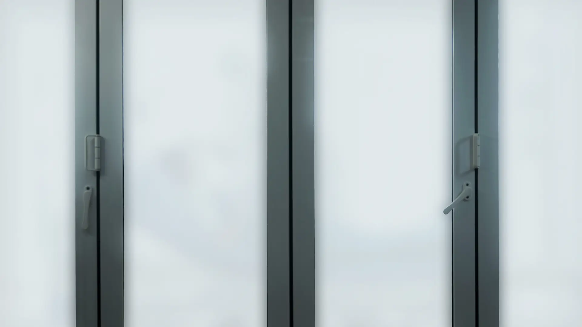 Hospital isolation room with smart glass switched to opaque for patient privacy and hygiene.