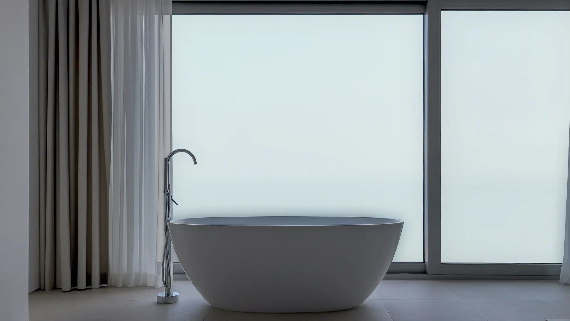 Bathroom window with smart glass switched to frosted mode for total privacy.